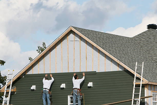 Professional Siding Contractor technician working in Maywood, IL